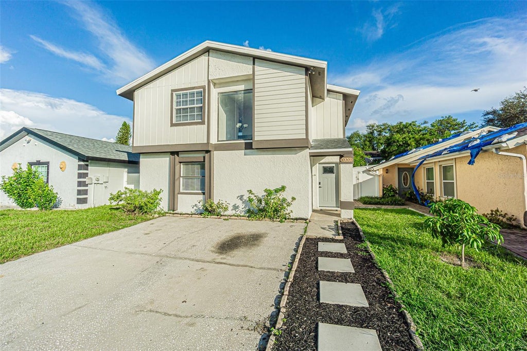 Photo of 10305 Bramblewood Place, Tampa, FL 33624 (MLS # TB8562569)