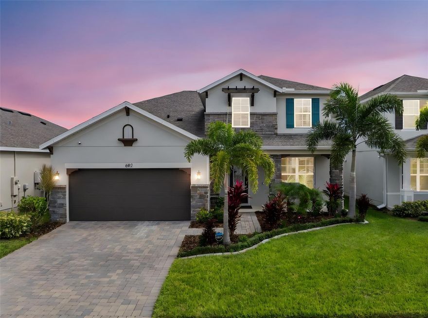 One or more photo(s) has been virtually staged. Beautiful 5-bedroom, 3.5-bath home offering the perfect blend of space, style, and location! The primary suite is conveniently located downstairs, featuring dual sinks, a soaking tub, and a separate shower. The main floor also includes a welcoming dining area and a gourmet kitchen with a gas stove, pantry, and plenty of prep space. The open family room leads to a spacious wraparound patio that extends along the back and side of the home — perfect for entertaining or relaxing outdoors.

Upstairs, you’ll find a loft offering flexible living space, along with four additional bedrooms — each with its own walk-in closet — and a Jack & Jill bath connecting two of the rooms.

The property backs up to a quiet section of the community greenspace, offering extra privacy with no direct rear neighbors. Enjoy an unbeatable location close to Publix, Chipotle, and Starbucks, all within a beautiful, well-connected neighborhood!