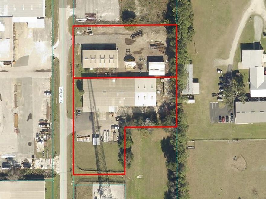 Exceptional industrial/manufacturing property near I-75. 2.47 acres includes 4 buildings with over 22,000 SF of office/warehouse space zoned M-2 Heavy Industrial which allows for outdoor storage. Property is on well and septic and is fenced for secure storage. The property also has as a truck well for two trucks, 3 phase power, updated offices, drive in access, new asphalt, and is strategically located with quick access to I-75, yet close to The Villages, Belleview, and Marion Oaks.