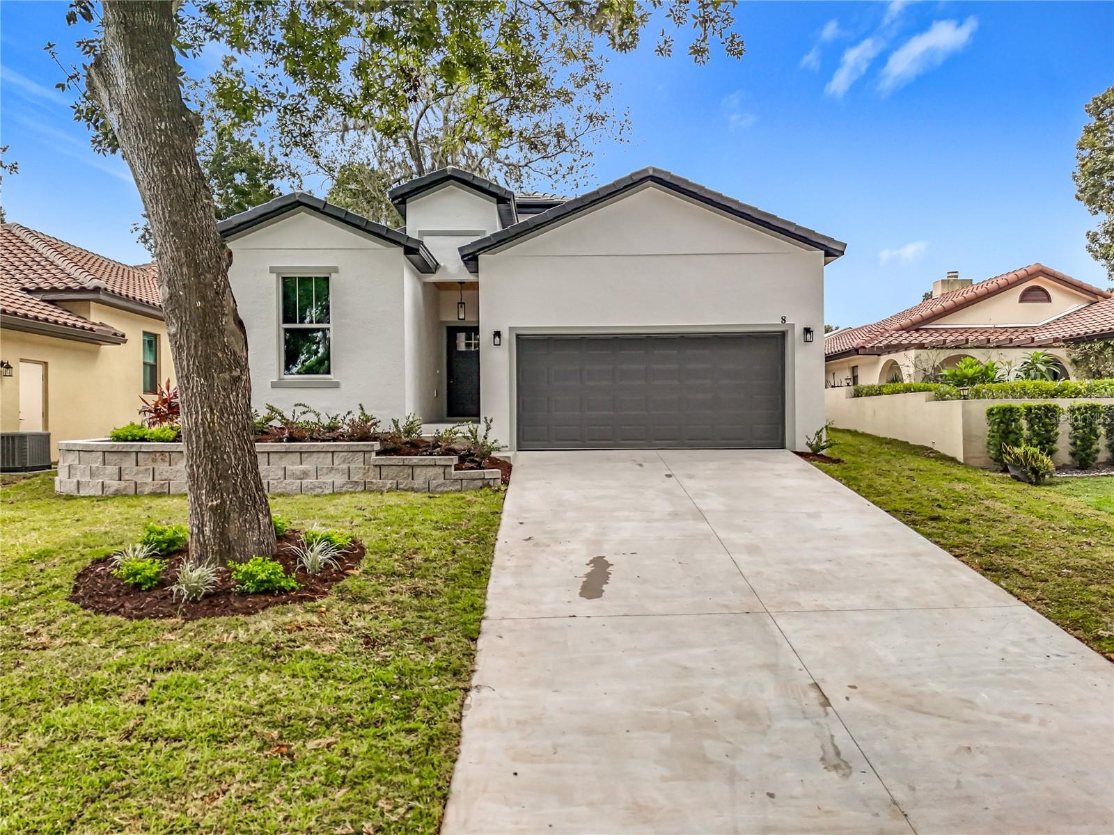 Welcome to this beautifully designed new construction home featuring 3 bedrooms, 3 bathrooms, and a versatile den—ideal for a home office or additional living space. The open floorplan is filled with natural light, showcasing elegant finishes throughout. The kitchen, complete with a center island, flows seamlessly into the living and dining areas, creating the perfect setting for both everyday living and entertaining. Step outside to the covered lanai, a serene retreat for relaxation. With modern touches and thoughtful design, this home offers comfort and style that are both timeless and contemporary.
Located in the sought-after Eustis Woodlands community, residents enjoy access to a community fishing dock and the ability to walk to the Lakeshore. Just a five-minute drive brings you to Downtown Eustis, known for its charming paved streets, antique shops, and a growing selection of restaurants. A wonderful neighborhood setting that blends convenience, charm, and lifestyle.