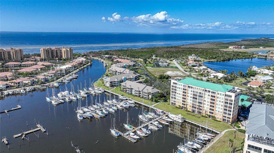 Your retreat in the sun is right here! Wake up each morning watching the Marina come to life and grab a cool drink in the afternoon and enjoy amazing sunsets, manatee and dolphin from your 3rd floor 2 bed/2 bath condo! With desirable southern exposure, you’ll have the benefit of loads of natural light during the day. This location in the heart of the Marina gives you immediate access to the docks and miles of walking paths to enjoy this amazing community. Furnished and ready to enjoy, this is perfect for you and your guests - or use it as an income-producing property that can be rented by the week year-round! You’ll appreciate all tile floors throughout - even on the lanai - that keep it clean and tasteful furnishings that make it comfortable. The well-designed kitchen is open to the living area so even the chef can enjoy the view. On the guest bedroom hall a clever door was added making the guest quarters ensuite with a private bath! At the other end the owner’s bedroom overlooks the water through two large sliding doors on the lanai. Plus there’s a motorized ROLL-DOWN HURRICANE SHUTTER on the lanai to protect your unit when you’re away! The ensuite bath features an updated pebble floor in the shower and a large walk-in closet next to the bath. Recent updates include AC with UV light for cleaner air in 2019, hot water heater 2021, reverse osmosis for water 2021, GE stacked washer and dryer 2023, new microwave, all interior paint, new ceiling fans, new faucets, all new lanai screens, Schlage wifi door lock and Nest wifi thermostat. Harbor Towers is one of the most popular seasonal communities for both owners and renters. And investors can generate rental income even after the winter season ends. Are you ready to enjoy all the Florida lifestyle offers with this low-maintenance Marina front condo? Come take a look!