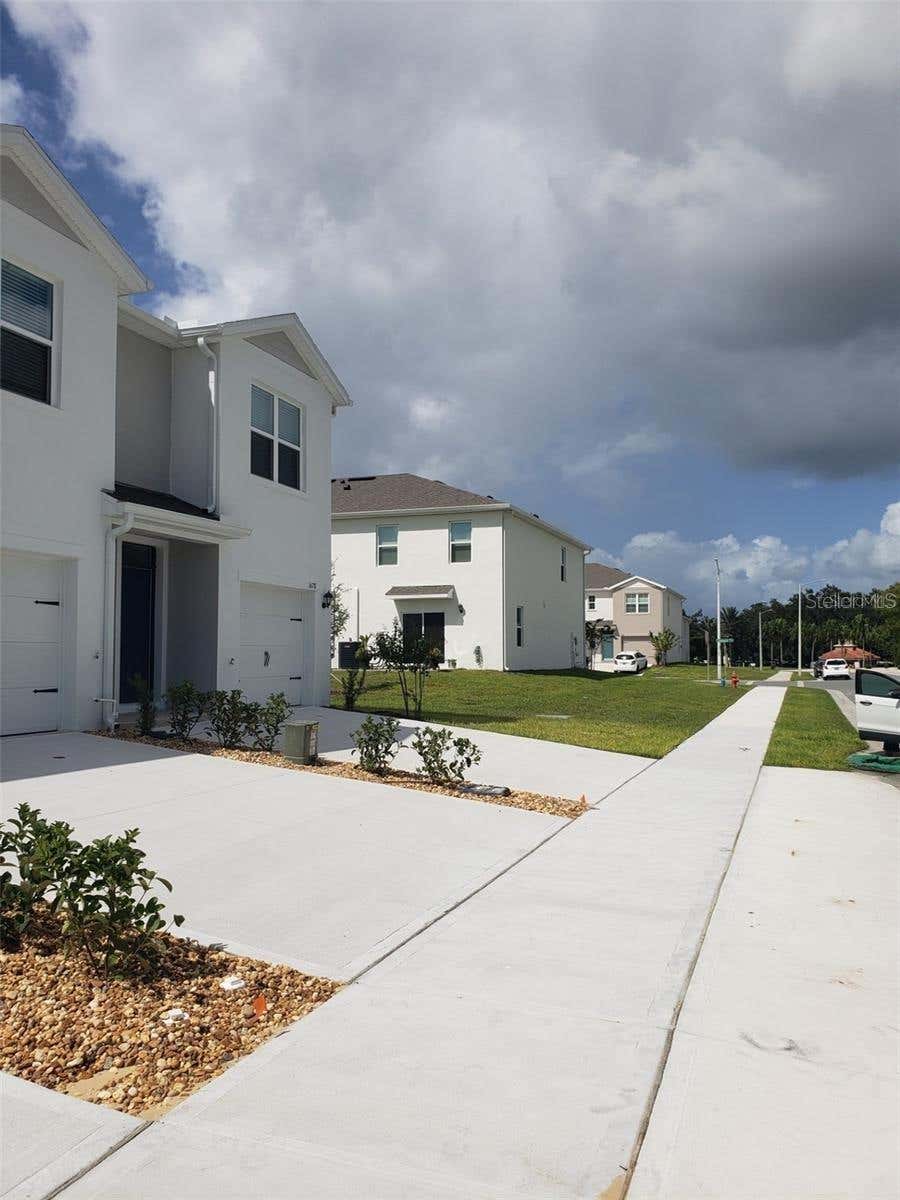 Photo of 1670 Rock Elm Road, Davenport, FL 33837 (MLS # O6427381)