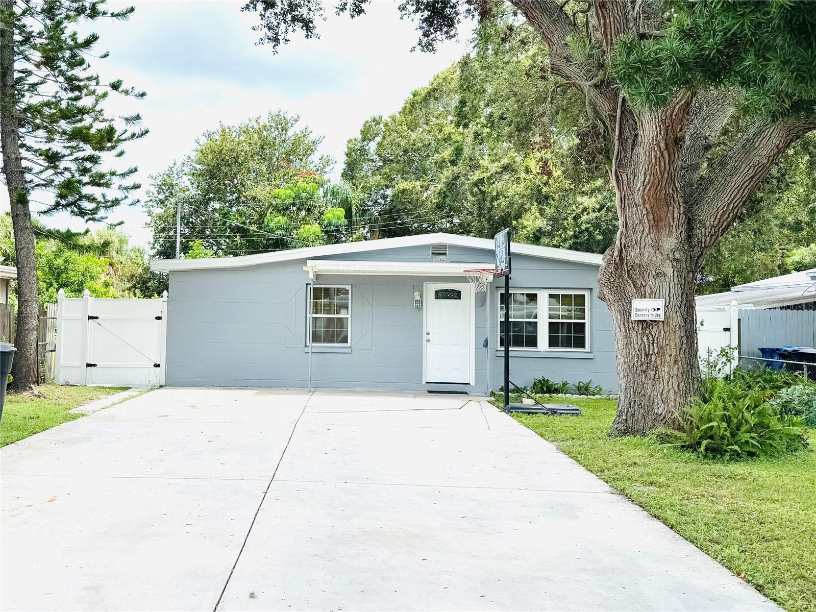 One or more photo(s) has been virtually staged. Discover your own private retreat in St. Petersburg! This charming 2-bedroom, 1-bath home offers a bright layout, thoughtful updates, and a sparkling private pool with a fenced backyard—perfect for relaxing or entertaining. Located just 10 minutes from the Gulf beaches in the desirable Tyrone area, with no flood insurance required, no HOA, and no rental restrictions. A move-in-ready gem with flexibility and value!