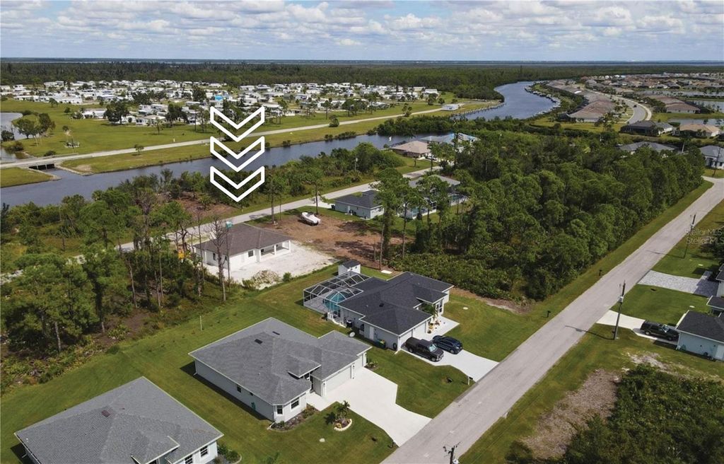 Photo of 14206 Ostrom Avenue, Port Charlotte, FL 33981 (MLS # O6300038)