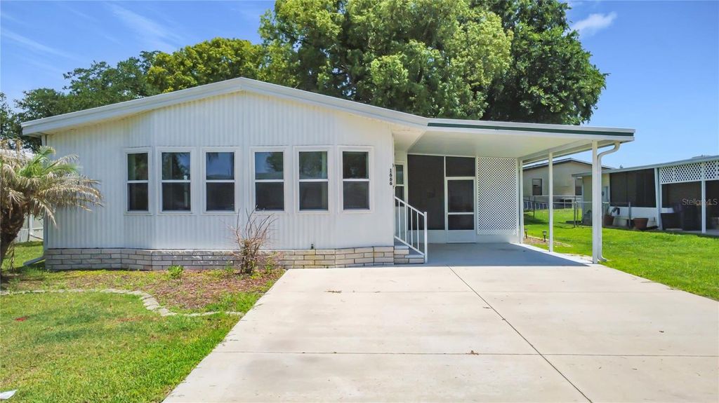 Photo of 1666 Elkhart Circle, Tavares, FL 32778 (MLS # G5112475)
