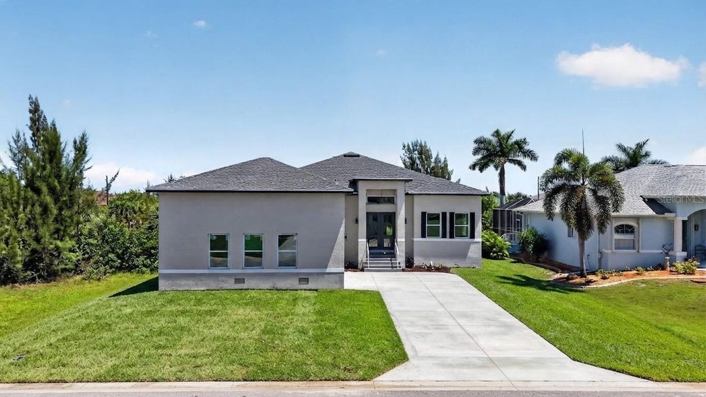 Photo of 15809 Melport Circle, Port Charlotte, FL 33981 (MLS # O6428052)