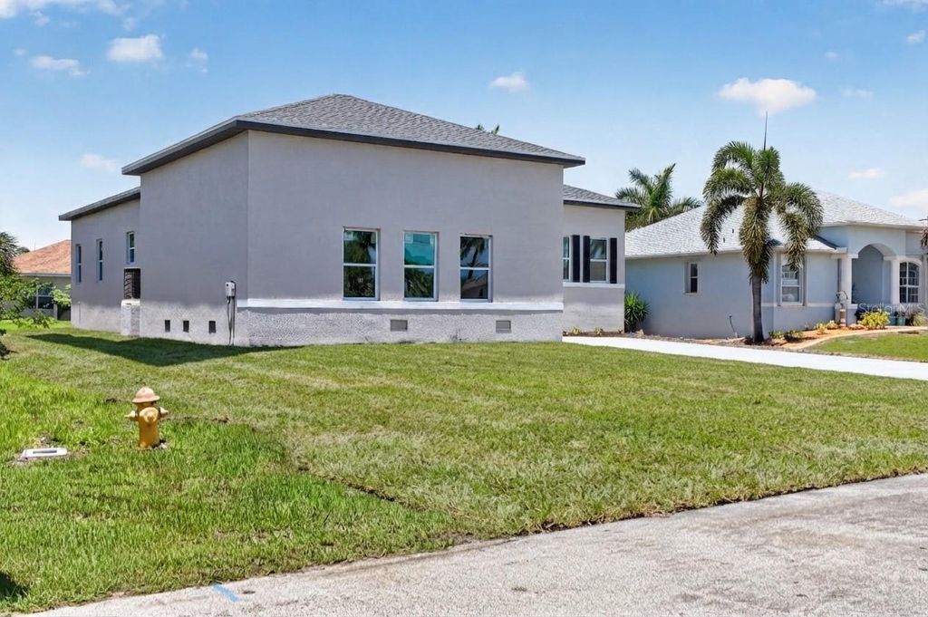 Photo of 15809 Melport Circle, Port Charlotte, FL 33981 (MLS # O6428052)