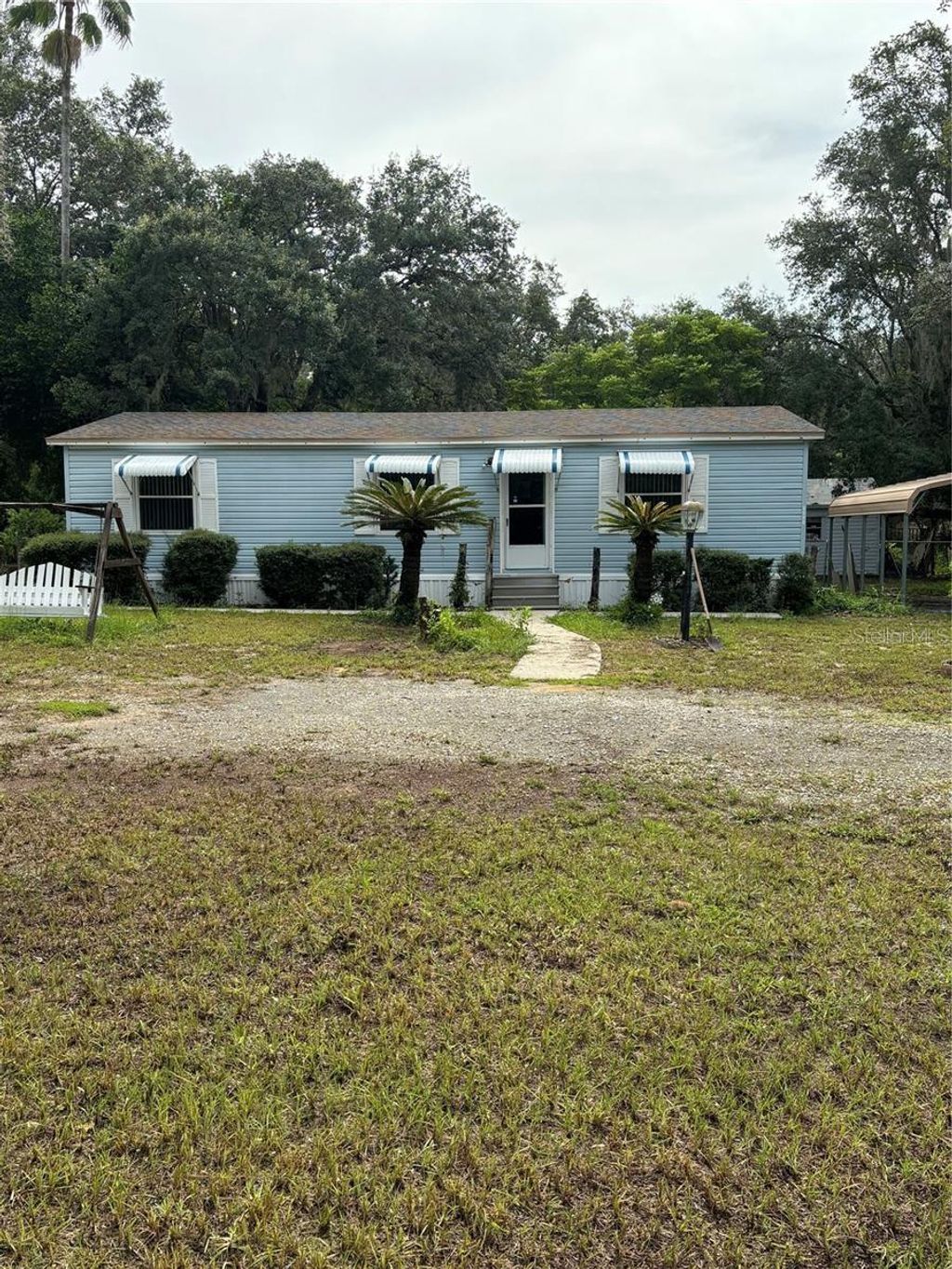 Photo of 3900 Fast Trot Trail, Lake Wales, FL 33898 (MLS # O6354279)