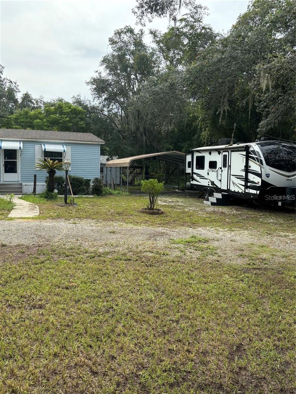 Photo of 3900 Fast Trot Trail, Lake Wales, FL 33898 (MLS # O6354279)