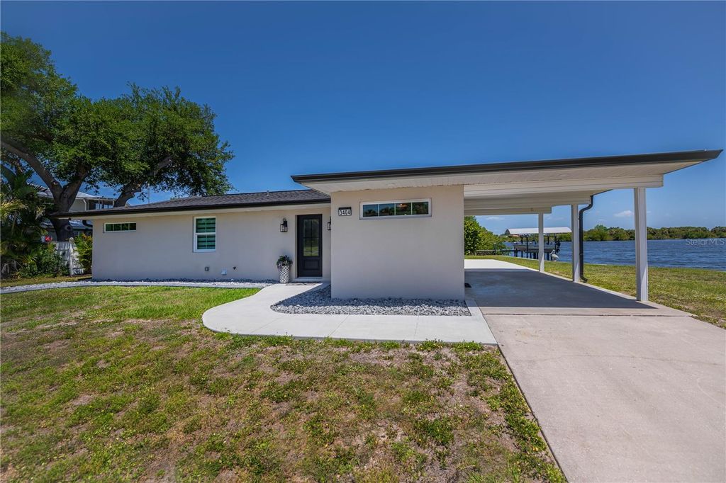 Photo of 3404 Lake View Boulevard, Port Charlotte, FL 33948 (MLS # C7525115)