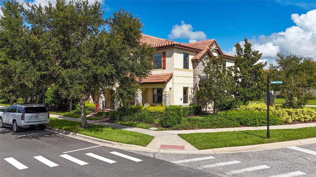 Photo of 10155 Eagle Creek Center Boulevard, Orlando, FL 32832 (MLS # O6399811)