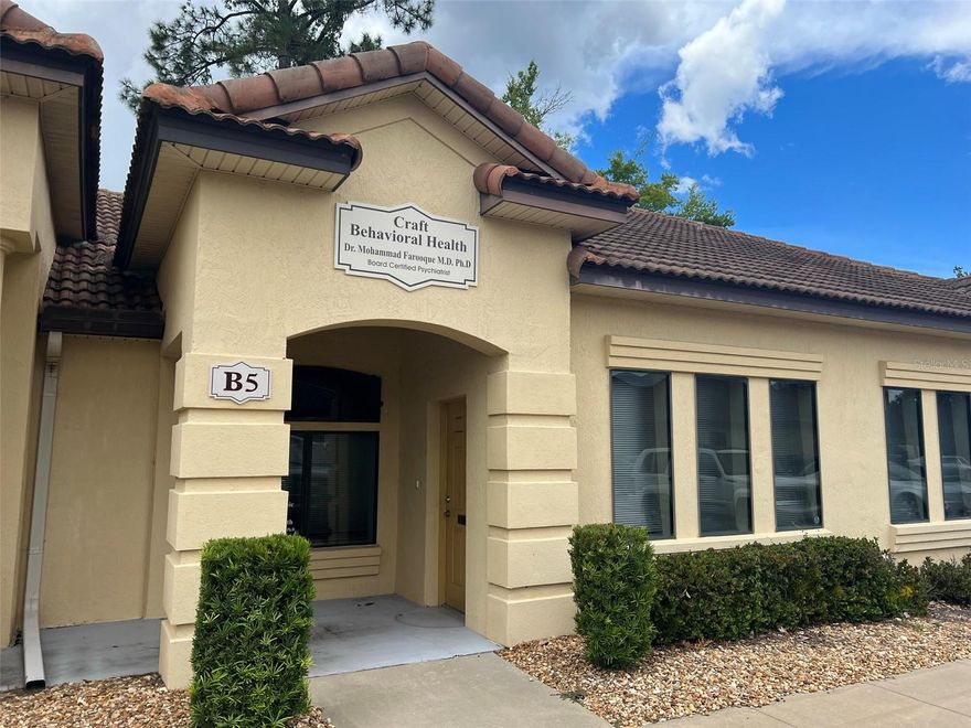 Office condo Unit B5 available for sublease in the Belle Terre Business & Professional Center. Unit will be shared with existing tenant (psychiatrist). Available space includes up to three private offices, shared reception/waiting area, conference room and restroom. Interior features high ceilings (9’ in office area; 10.5’ in reception area) and LVP flooring. Rate is $650/month for one dedicated office, $1150/month for two or $1550/month for three rooms. Owner pays association dues, property taxes, interior maintenance and base utilities (electric, water, Wi-Fi). Tenant responsible for rent, sales tax (3.0%) and any tenant-specific utilities. Complex has a mix of professional occupants including medical, legal, real estate and title companies. Convenient location at the corner of Belle Terre Parkway and Palm Coast Parkway NW. Walkable area with restaurants, shopping, banking, and postal service nearby. Located one mile east of Advent Health Palm Coast Parkway Hospital.