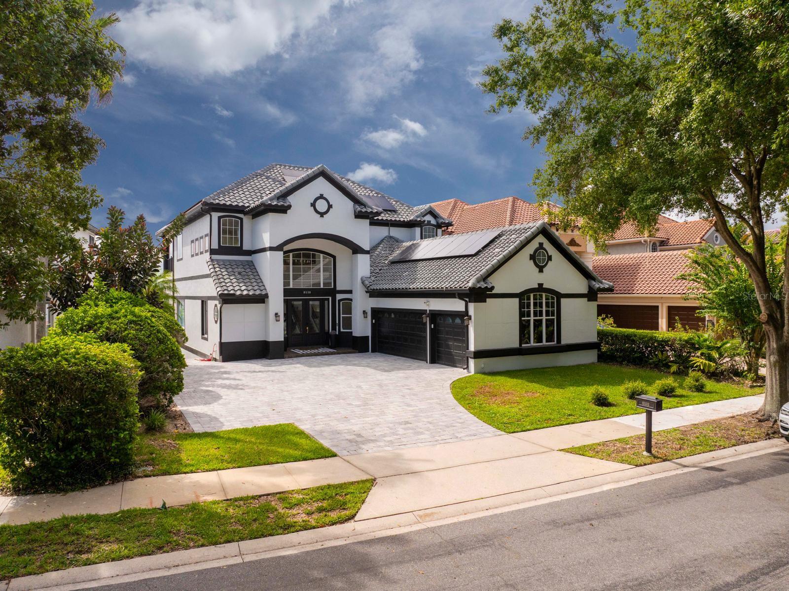 One or more photo(s) has been virtually staged. Welcome to this exceptional 3-story lakefront estate, offering 6,244 sq. ft. of refined living space on a navigable lake with direct lake access. Recently completed top-to-bottom full renovation (June/24), over $650,000 in renovations, blends modern elegance, high-end finishes, and unparalleled functionality.
Property Highlights:
Fully renovated inside and out – including bathrooms, garage, and all major features, Freshly painted & sealed interior and exterior, including roof, Energy-efficient solar panels reducing power bills by up to 60. Custom cabinetry throughout, with floor-to-ceiling kitchen cabinets. High-end KitchenAid appliances. New paver driveway.
New AC Unit.
Outdoor Living & Entertainment:
Direct access to the lake with expansive water views. Travertine decking and low-maintenance turf. Complete outdoor kitchen featuring:
Built-in grill, Outdoor refrigerator, Ice maker, Generous counter space for gatherings, New Pool Heater.
The pool was completely renovated 1 year ago, including a new finish and glass tile throughout the spa.
Enjoy SeaWorld’s nightly fireworks right from your backyard.
Indoor Entertainment
Custom-built bar with full cabinetry. Dry wine cellar with 30+ bottle capacity. Separate refrigerators for beer,and wine.
Community Amenities (HOA)
Access to tennis courts. Fully equipped fitness center. Gated and Guarded community for privacy and security.
Additional Features
Multiple designer wallpaper finishes throughout. Hurricane-impact windows for safety and peace of mind.
Negotiable modern furniture (less than 1 year old) You will also have the option to have the house partially furnished
This home is truly turnkey—every detail thoughtfully designed for luxury, convenience, and comfort, with unmatched entertainment both indoors and outdoors.