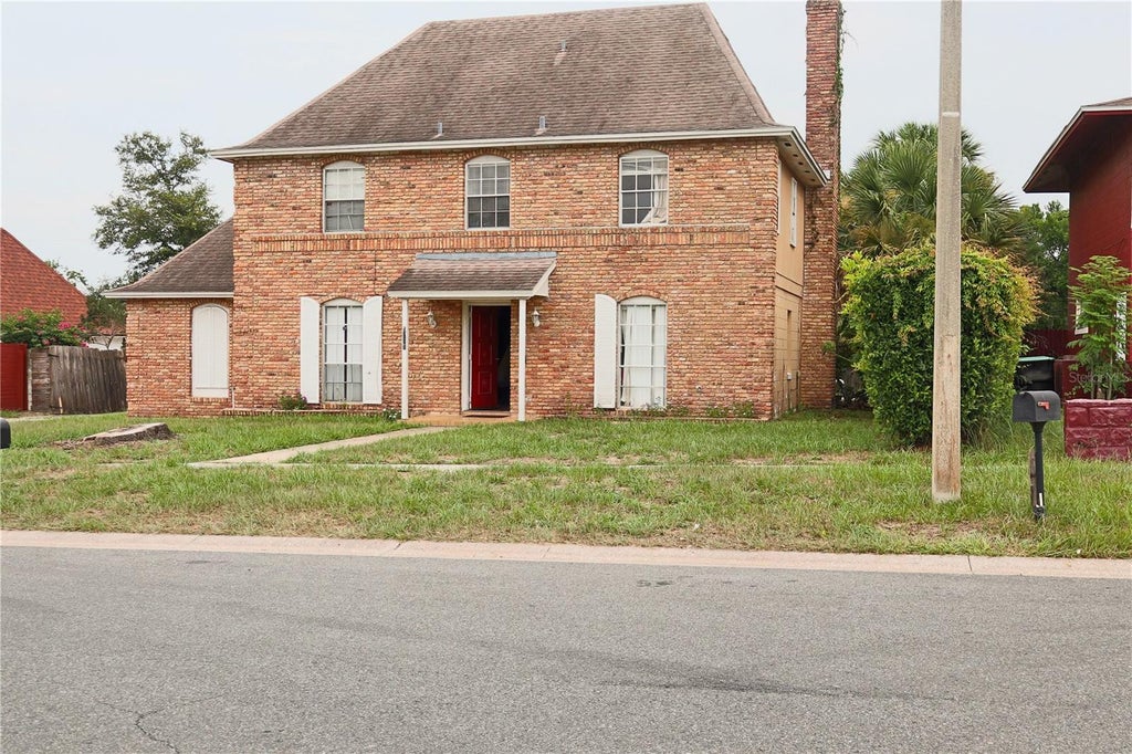Photo of 5891 Sir Henry Road, Orlando, FL 32808 (MLS # O6421412)