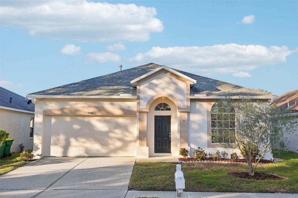 Photo of 27451 Sky Lake Circle, Wesley Chapel, FL 33544 (MLS # TB8324837)