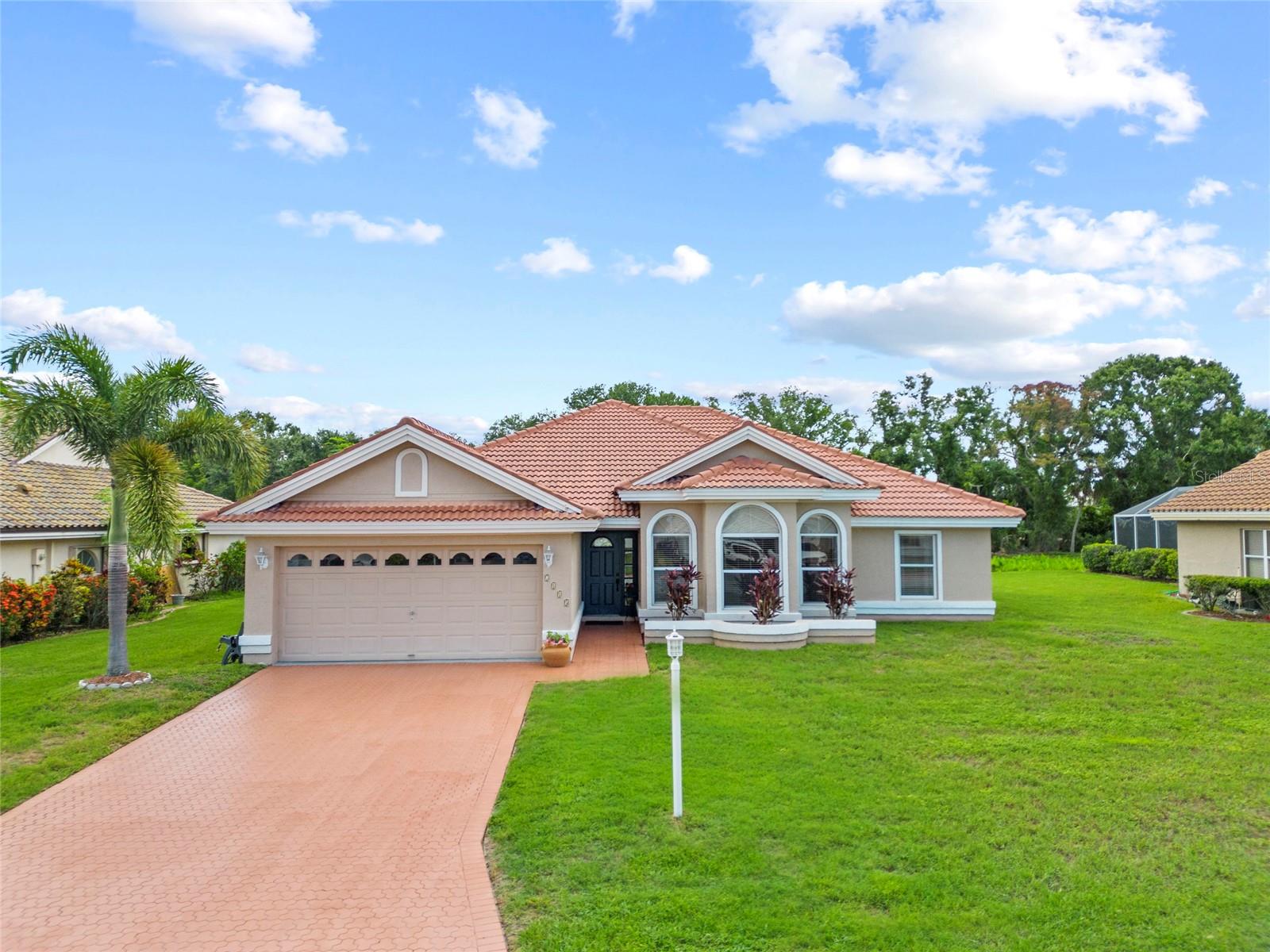 Welcome to The Trails—where peaceful living meets unbeatable convenience in one of Sarasota’s most desirable communities. Tucked away on a quiet cul-de-sac street, this beautifully maintained 4-bedroom, 2.5-bath home with heated pool and spa blends timeless style with modern comfort. A barrel tile roof, paver driveway and walkway create inviting curb appeal, while the thoughtfully designed open-concept layout offers the perfect flow for both relaxed living and elegant entertaining.
Inside, the updated kitchen is the heart of the home, featuring soft-close cabinetry, rollout shelving, granite countertops, and stainless steel appliances—ideal for casual meals or hosting guests. Soaring ceilings and no carpet throughout add to the home’s bright, airy feel and low-maintenance lifestyle.
Whether you’re gathering with friends in one of the two spacious living areas, enjoying dinner in the formal dining room, or relaxing on the lanai with views of the private backyard, this home offers the kind of everyday luxury that makes Florida living so special.
The primary suite is a true sanctuary, offering a peaceful escape with direct access to the lanai, a walk-in closet, and a spa-inspired bath complete with a soaking tub, separate shower, private water closet, and an oversized linen closet. Thoughtfully positioned for privacy, it’s the perfect place to unwind at the end of the day.
Step outside to your screened lanai, where a heated pool and spa overlook a lush, tranquil setting—ideal for morning coffee, afternoon swims, or sunset gatherings. Whether you’re entertaining guests or enjoying a quiet evening at home, this outdoor space is designed to enhance your Florida lifestyle.
Ideally located just minutes from UTC’s premier shopping and dining, Benderson Park, Sarasota-Bradenton International Airport, and I-75—with the world-renowned Gulf Coast beaches only 30 minutes away—this home offers the perfect blend of convenience, comfort, and relaxed Florida elegance.
Opportunities like this don’t come often—schedule your private tour today and experience all this Sarasota gem has to offer!