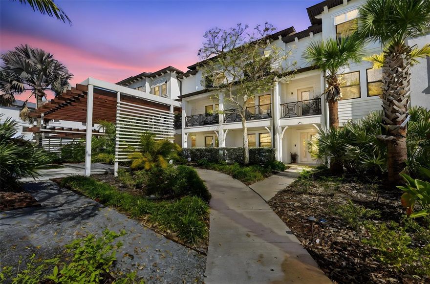 Welcome to 4921 W Paul Avenue, Unit #5, a beautifully updated 3-bedroom, 3.5-bathroom, three-story condo located in the heart of South Tampa. This thoughtfully designed home offers a 2-car garage with rear-facing access and is nestled within a charming community featuring a lush, landscaped courtyard at its center. Step inside to discover a bright, open-concept living space with modern finishes throughout. The main living level showcases a stunning kitchen with white cabinetry, stainless steel appliances, expansive counter space, and a large breakfast bar, seamlessly flowing into the dining and living areas—perfect for entertaining or everyday living. The home’s multi-level layout provides both privacy and functionality, with spacious bedrooms and well-appointed bathrooms on separate floors. The primary suite offers generous space, natural light, and a beautifully updated en-suite bath, while additional bedrooms are ideal for guests, a home office, or flexible living needs. Enjoy indoor-outdoor living with a private balcony, perfect for morning coffee or evening relaxation. Additional features include modern lighting, updated flooring, and stylish design elements throughout. Located in a highly desirable South Tampa area, this home offers convenient access to shopping, dining, major roadways, and everything the Tampa Bay lifestyle has to offer. A move-in ready, low-maintenance property combining style, space, and location—schedule your private showing today!