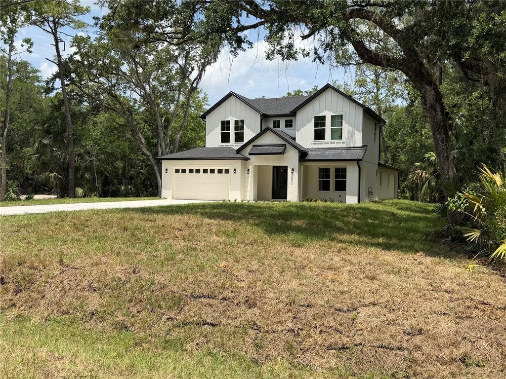 Photo of 1602 Lake Harney, Geneva, FL 32732 (MLS # O6393137)