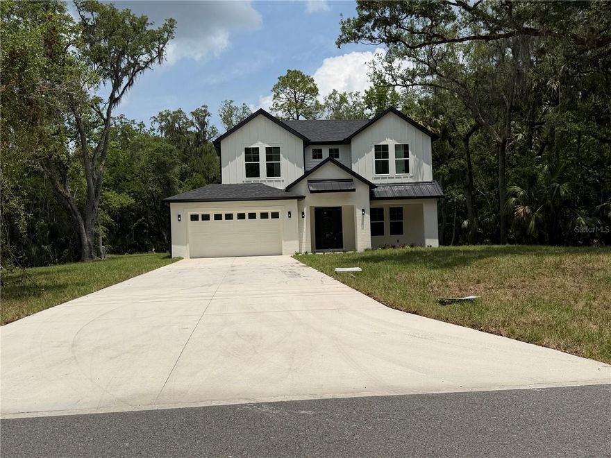 Welcome Home to Your Dream Oasis in Geneva, FL!

Nestled on a sprawling 1.18-acre lot, this stunning new construction home offers the perfect blend of modern luxury and serene country living. Boasting 2,477 sq ft of thoughtfully designed space, this 4-bedroom, 3-bathroom gem is an ideal sanctuary for families and entertainers alike.

Step inside to discover an open-concept layout that seamlessly connects the living, dining, and kitchen areas. Abundant natural light floods every corner, accentuating the high ceilings and elegant finishes throughout.

The heart of the home is undoubtedly the gourmet kitchen, featuring top-of-the-line stainless steel appliances, quartz countertops, and ample cabinetry. Enjoy family meals at the oversized island or host dinner parties in the adjacent dining area.

Retreat to one of four generously sized bedrooms, including a master suite that feels like your own private getaway. The master bath is a sanctuary of relaxation, complete with dual vanities, a soaking tub, and a spacious walk-in shower.

Step outside to your expansive backyard, where the possibilities are endless. Picture summer barbecues, gardening, or simply enjoying the tranquil surroundings. With plenty of space to add a pool, workshop, or playground, this outdoor oasis is ready for your personal touch.

Situated in the charming town of Geneva, you’ll enjoy the perfect mix of rural tranquility and recreational activities. Explore nearby parks, take leisurely strolls along the scenic trails, or embark on outdoor adventures in the surrounding natural beauty.

This home is not just a place to live; it's a lifestyle! Experience the joy of country living while being just a short drive from the vibrant cities of Orlando and Sanford. With top-rated schools, friendly neighbors, and a safe community atmosphere, it's ideal for families seeking spacious living without sacrificing accessibility.

Don’t miss out on this rare opportunity to own a brand-new home in Geneva, FL! Schedule your private tour today and let this beautiful property welcome you home. Your dream lifestyle awaits!