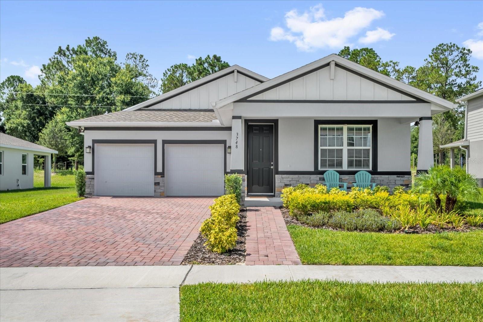 **Like-New Modern Home in Apopka – Move-In Ready with Upgrades!**
Why wait to build when you can move right into this beautifully upgraded, nearly new home? Built just a year ago, this 3-bedroom, 2-bath home with a bonus office/flex space offers the perfect blend of style, comfort, and functionality.
Beautifully upgraded Harrison Model "Elevation C" gives you the luxurious stone accents and large front porch.
Step inside to discover luxury vinyl plank flooring throughout the main living areas and office, plus plush upgraded carpet in the bedrooms. Elegant French doors open into the private office—perfect for working from home or transforming into a cozy flex space.
The chef’s kitchen features stunning quartz countertops, stainless steel appliances, and a gas stove, making cooking a pleasure. There is a closet pantry and a laundry room with washer and dryer. Enjoy your meals in the breakfast nook, or cozy up to the bar and talk to the chef while they're cooking.
The spacious primary suite includes a walk-in closet, dual sinks with quartz counters, a fully tiled walk-in shower, and a private "throne room."
Enjoy the Florida lifestyle with a covered front porch, a covered rear lanai wired for natural gas—ideal for future outdoor cooking—and an oversized 70' lot offering room to breathe.
The secondary bathroom is finished with a tiled tub/shower combo, and the home feels barely lived in—spotless, modern, and move-in ready.
Relax in the evening or on the weekend in the community pool.
Skip the delays and expenses of new construction—this upgraded gem is ready to welcome you home.