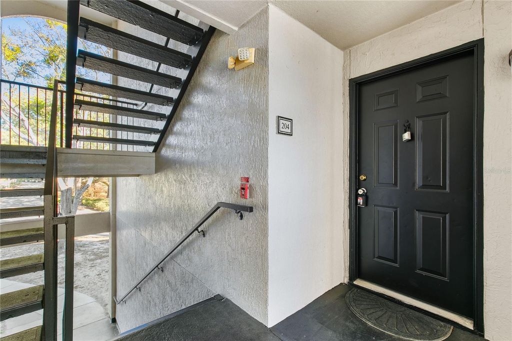 Photo of 7605 Pissarro Drive #204, Orlando, FL 32819 (MLS # O6379570)