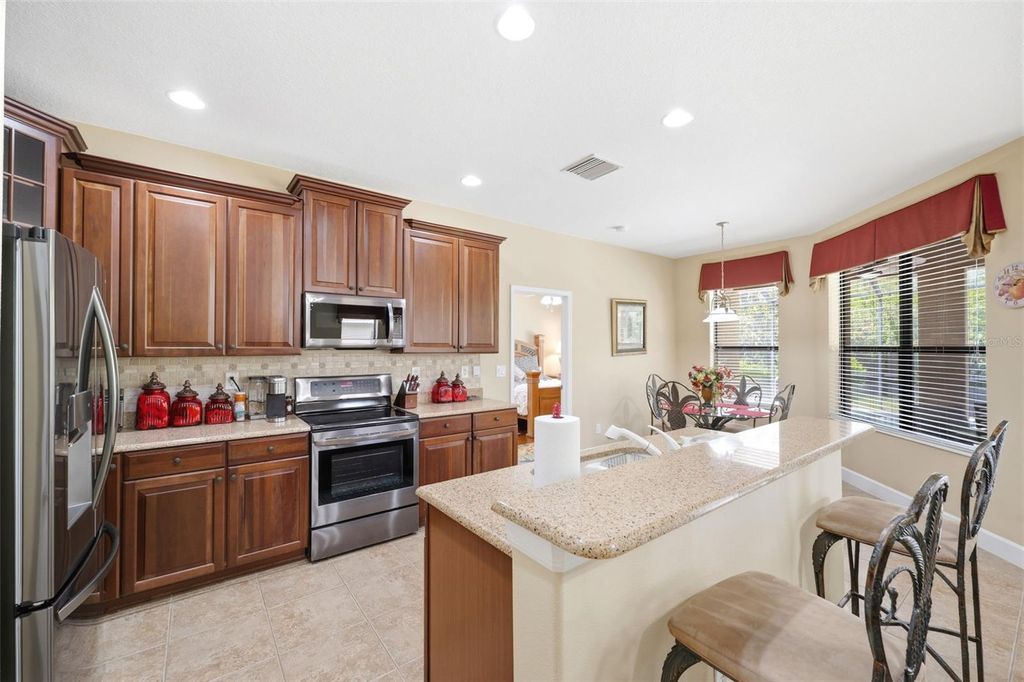 Photo of 107 Silver Falls Dr, Apollo Beach, FL 33572 (MLS # W7885984)