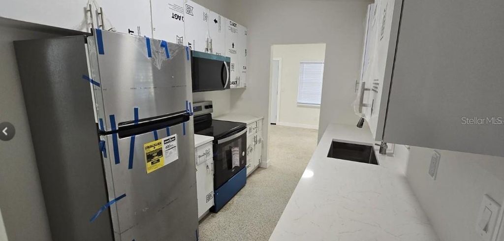 Photo of 1634 Banyan Drive, Venice, FL 34293 (MLS # TB8484480)