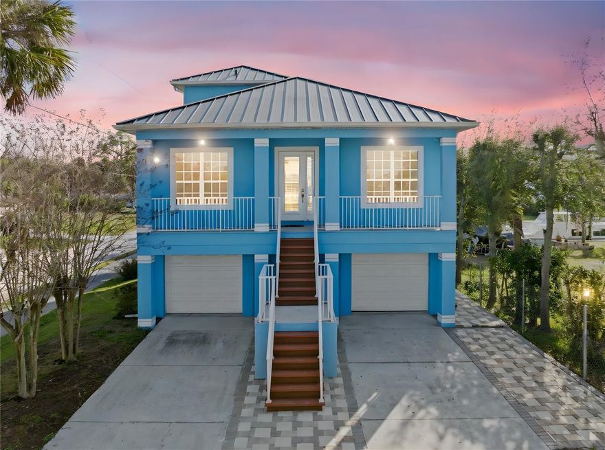 One or more photo(s) has been virtually staged. Coastal Living with Exceptional Features – No HOA
Welcome to this stunning elevated coastal stilt home in the desirable Richey Cove subdivision, offering direct canal access to Miller’s Bayou and the Gulf of Mexico. This 1,637 sq ft residence features 3 bedrooms and 2 full bathrooms, including one dual-access bathroom to the two guest bedrooms, thoughtfully designed for luxury, efficiency, and low-maintenance waterfront living.
Boaters will appreciate the 10,000-lb boat lift, private kayak launch, and expansive canal access. The property includes a 16x8 storage shed and an impressive 3-car stacked garage, complemented by elegant pavers.
Inside, the home features tile and wood flooring throughout, granite countertops in the kitchen and bathrooms, and plantation shutters. The kitchen is equipped with high-end appliances, including a convection oven, induction range, microwave/convection combo (all vented to the exterior), Bosch dishwasher, built-in coffee K cups in refrigerator and a spacious pantry. A Bosch ventless stacked washer and dryer add convenience and efficiency.
The primary suite offers his-and-hers sinks, generous space, and a private retreat feel, while the second bedroom features dual his-and-hers closets with direct balcony access. All balconies are elegantly tiled, enhancing the indoor-outdoor lifestyle.
Additional highlights include:
• Elevator access to the second floor
• Two elevated balconies with no-see-um screens on second floor
• One screened first-floor patio
• Peek-a-boo views of Miller’s Bayou from third-floor balcony
• Fresh interior and exterior paint
• Low-maintenance stucco exterior
• 50-year metal roof (only 6 years old) .040 aluminum with standing seam
• Energy-efficient solar system with owner-provided electric bills ~ $35/month
• Roof and solar rated to 175/mile an hour wind
• 3-ton A/C (2 years old) plus a separate 2-ton, 2-zone system
Enjoy spectacular sunsets and Fourth of July fireworks from the privacy of your own home. Conveniently located near a waterfront park and just minutes from popular restaurants and amenities, this property offers the perfect blend of privacy, recreation, and accessibility.
No HOA. No hurricane damage sustained from Hurricanes Helene or Milton.
A truly exceptional coastal oasis ready for its next owner.