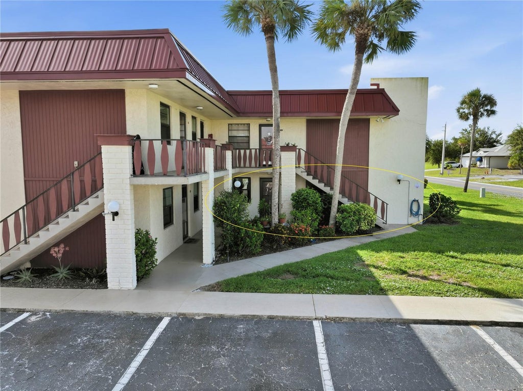 Photo of 72 Boundary Boulevard #210, Rotonda West, FL 33947 (MLS # D6148495)