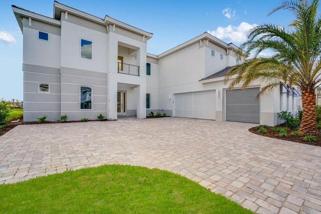 Photo of 33745 Ocean Spray Lane, Wesley Chapel, FL 33543 (MLS # J982609)