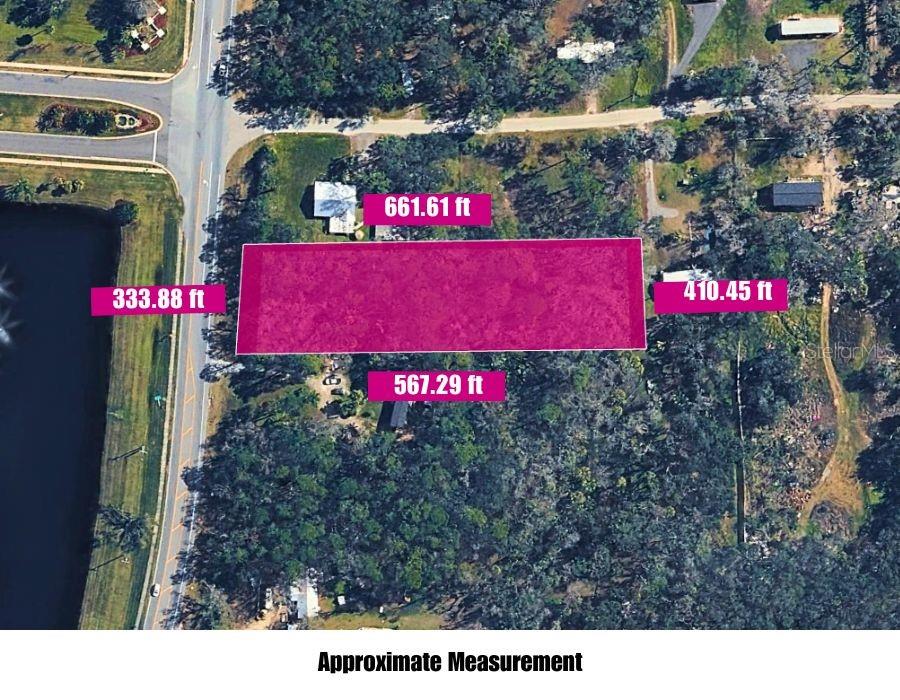 Photo of Lithia Pinecrest Road, Valrico, FL 33596 (MLS # TB8550595)