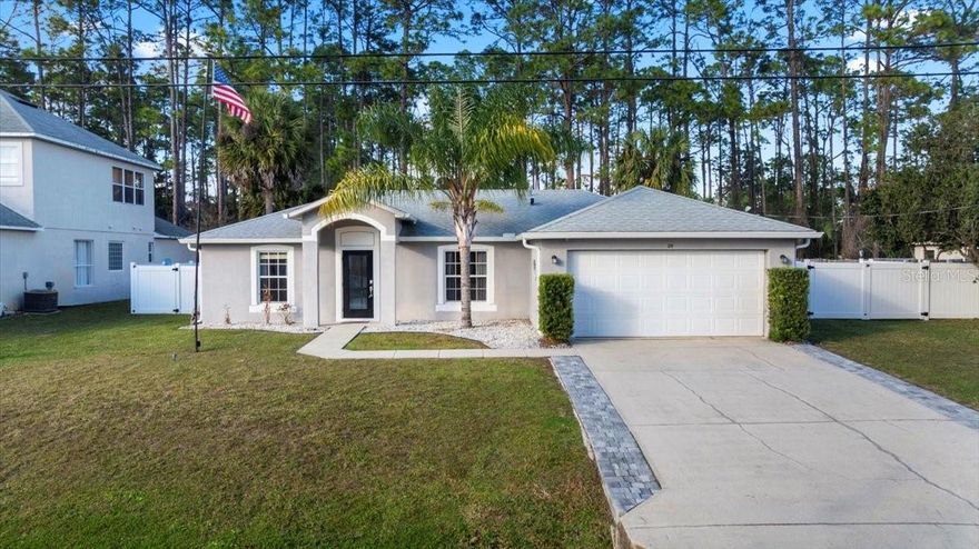 Privacy, upgraded, and built for Florida living and entertaining. This beautifully updated home sits on an oversized fenced lot with two gated entrances one large to park boat or RV one smaller walkthrough and no rear neighbors—just protected preserve views. Enjoy year-round outdoor living with a brand-new enclosed pool (lifetime warranty), hot tub, and a lighted 12x17 dock on a freshwater canal. Inside, you’ll find a newly updated kitchen, baths, and flooring, plus hurricane-rated windows and a new front door for peace of mind. Big-ticket items are already done: newer roof, A/C, water heater, and new gutters. Storage is a standout with a storage barn and an additional shed with electric. A rare setup offering space, privacy, and turn-key upgrades.