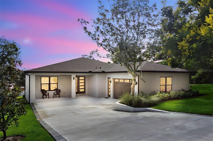 Welcome to this beautiful brand new custom built home! From the inviting front porch, step into the welcoming foyer that opens to an impressive open concept living area, ideal for everyday living and entertaining. the large custom kitchen is a chefs dream, featuring granite countertops, luxury vinyl flooring and ample cabinet space. This home offers four bedrooms and three full bathrooms. Relax in the beautiful primary bedroom with beautiful lake views, a luxurious bathroom featuring a soaking tub, walk in shower, and a walk in closet. Separate inside laundry room with stainless Steele sink and granite counter top. Enjoy Florida living from the screened in back porch, the perfect spot to take in the amazing views of Lake Apopka. Additional highlights include an oversized two car garage. This home is a block home with spray foam insulation in the block walls for energy efficiency.This custom home truly has it all, thoughtful details and serene lake views. Live in the quaint town of Montverde but close to great restaurants, shopping and the turnpike. DONT MISS THE OPPORTUNITY TO MAKE IT YOURS!!!!