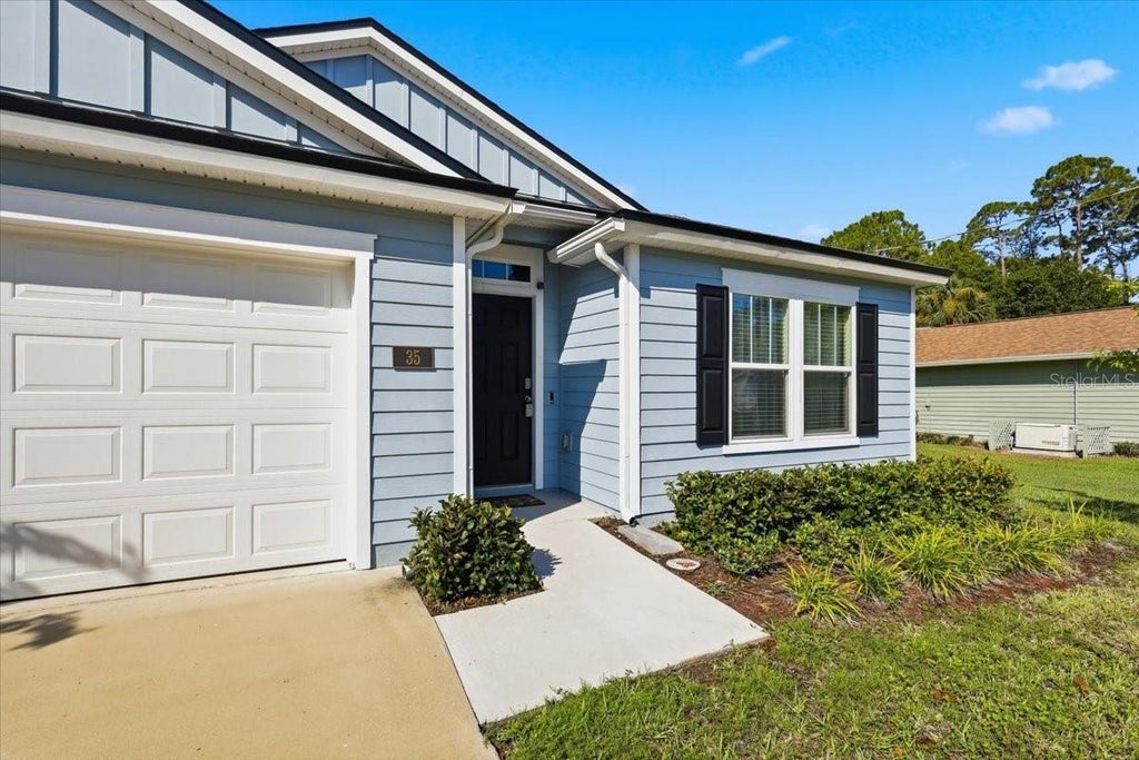Photo of 35 Putter Drive, Palm Coast, FL 32164 (MLS # FC321037)