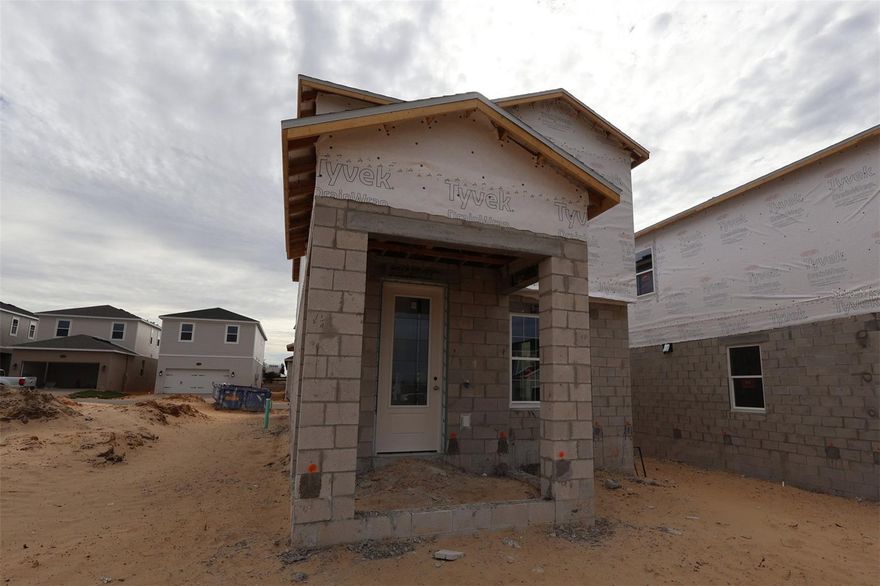 Under Construction. Discover this stunning new construction home at 17340 Beachgrass Alley, Winter Garden, built by M/I Homes. This thoughtfully designed 3-bedroom, 2.5-bathroom home offers 1,816 square feet of comfortable living space with an open-concept layout that seamlessly connects the main living areas.
 
Step into the spacious family room, which is full of natural light thanks to several large windows. It's also seamlessly connected to the kitchen and dining area, creating an inviting atmosphere for both relaxation and social gatherings. The kitchen is sure to impress with its large island, corner pantry, stunning countertops, loads of cabinets.

Up the stairs, which are open to the family room below, you'll find all 3 bedrooms, a shared full bathroom, and a conveniently placed laundry room. Your owner's suite features a tray ceiling, a huge walk-in closet and en-suite bathroom with a double-sink vanity, and private water closet.