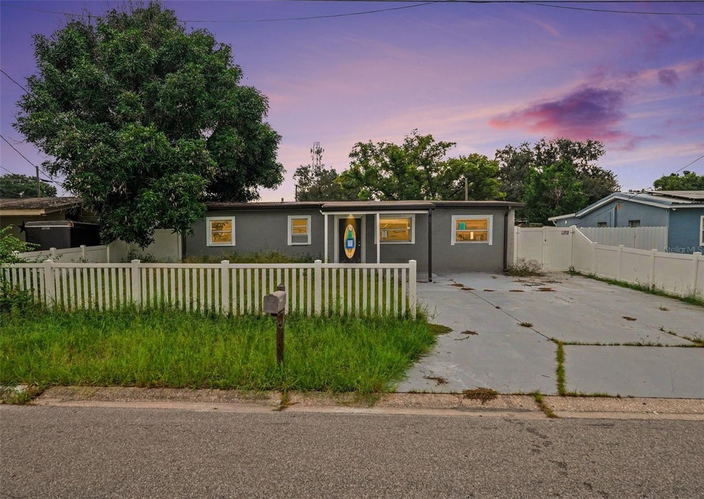 Photo of 10925 N Florence Avenue, Tampa, FL 33612 (MLS # TB8555627)
