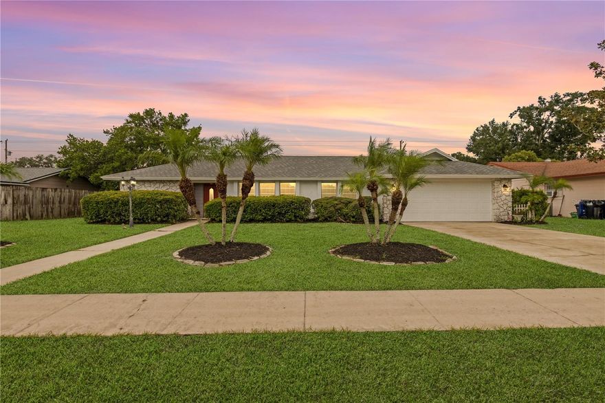 One or more photo(s) has been virtually staged. Welcome to your spacious POOL HOME featuring a recently RESURFACED and beautifully RE-TILED POOL (2026)!  Enjoy this 4-BEDROOM, 2-BATH, BLOCK, POOL HOME which offers an inviting sanctuary for you and your family to make new Life Memories in. Nestled on a .27 ACRE LOT, this property provides ample space for outdoor activities, gardening, or simply unwinding in your own POOL Retreat. TILE and VINYL WOOD FLOORING throughout the main Living area and ONLY new carpet in the Bedrooms. The OVERSIZED-GARAGE comes complete with a WORKSHOP AREA, perfect for the Handyman or Hobbyist to bring their projects to life! While the charming STONE Exterior captivates, the interior awaits your personal touch to transform it into a reflection of your unique style! Recent Updates include a NEW ROOF (August 2024), Updated Hall Bath, New Vinyl Flooring and Carpet (ONLY in the Bedrooms), Interior Paint, NEW SLIDING GLASS DOOR (2025), NEW LIGHTING/FAN (all in 2024), A/C (2019). Less than 15 minutes to UCF, less than 20 minutes to the Orlando Internation Airport and the Waterford Lakes Town Center where you will find a Plethora of Dining, Shopping, and Entertainment Options. This HOME is conveniently located to ALL you need and want to do! Don't miss out on the opportunity to make this house YOUR home. Schedule a viewing today and discover the endless possibilities awaiting you in the Charming Home, with NO HOA, ZONED WINTER PARK HIGH SCHOOL.