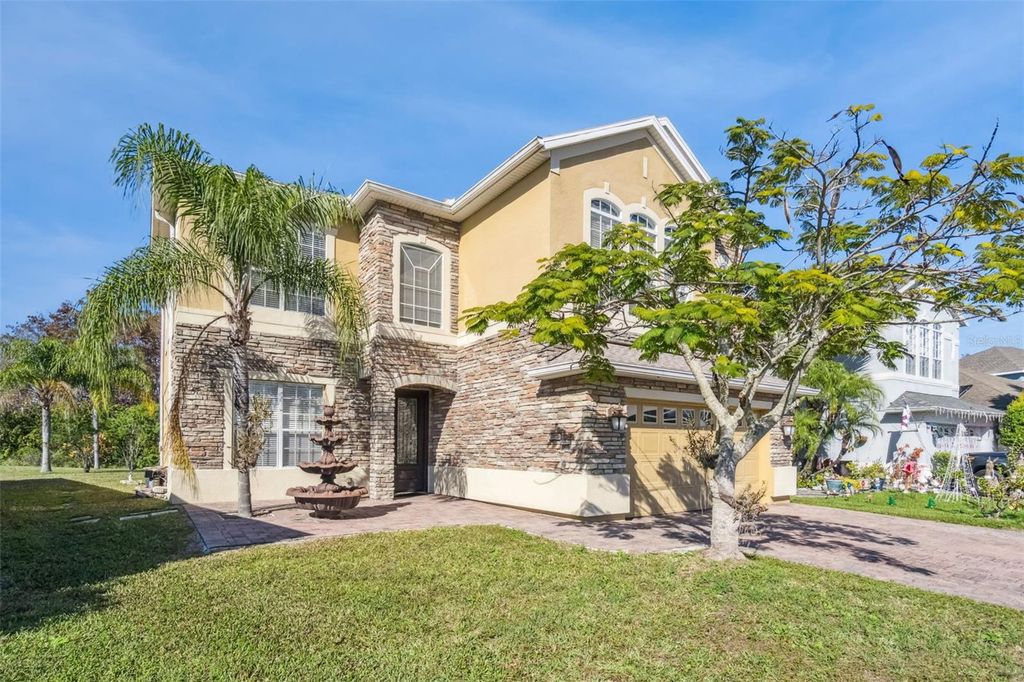 Photo of 2250 Windcrest Lake Circle, Orlando, FL 32824 (MLS # O6372450)