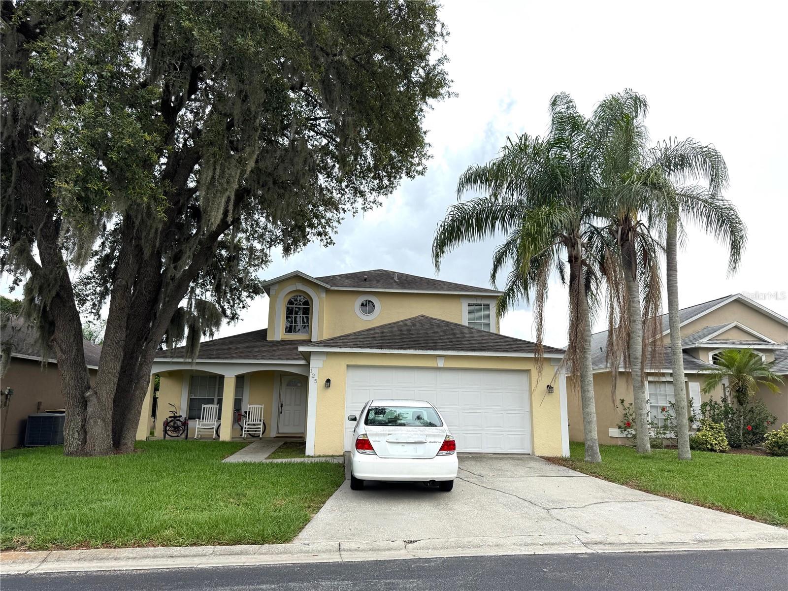 LOW HOA! NO CDD! GREAT Opportunity to own a pool home in beautiful Gated/Guarded Ridgewood Lakes Community. Approximate 2000 heated sqft featured 3 bedroom, 1 den/office, 1 loft, 2.5 bath, 2 card garage with private pool&spa. High ceiling loft above entrance and living room area. Perfect nature lights. Large open floor plan. Office/Den/Formal dinning connected the kitchen. Separated breakfast area. Master bedroom downstairs with garden tub and separated shower, double vanity. Two bedrooms and one Loft upstairs. Enjoy the beautiful community life style with golf, tennis, trails, boats, etc. Conveniently closed to Publix, Walmart, shoppings, restaurants are all around. Short drive to US27, I4, easy to Disney world, Universal, Tampa, downtown of Orlando. Schedule a showing today.