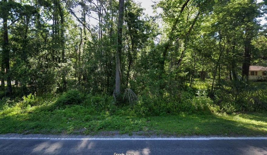 Buildable 0.96-acre (approx.) wooded parcel in a quiet Brooksville setting with flexible residential zoning. This lot offers approximately 150 feet of road frontage and a depth of 300 feet, providing ample space for a site-built home or manufactured home.

Zoned R1A, allowing single-family homes (minimum 900 sq ft) and mobile homes (minimum 600 sq ft), giving buyers multiple options for development. Setbacks include 25 feet front, 10 feet on each side, and 20 feet rear.

Located among existing homes and mobile residences, the property offers a balance of privacy and established surroundings. A large portion of the lot lies in Flood Zone X (higher and buildable area), with Flood Zone A also present — buyer to verify buildability, site planning, and flood requirements.

County water is available, electric service is provided by Withlacoochee River Electric Cooperative, and septic will be required.

Whether you’re looking to build, place a manufactured home, or hold land for future use, this parcel offers space, flexibility, and accessibility in a growing Hernando County area.

Lot dimensions and acreage are approximate. Information provided is deemed reliable but not guaranteed. Buyer to verify exact measurements, boundaries, utilities, and all property details through their own due diligence.