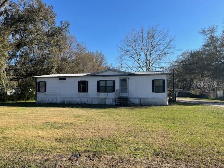 This listing has lots of potential. Both homes are included in sale, will not separate. 3736 is 1990 doublewide mobile home with 3/2 and 1404 sq feet. 3742 is 1987 singlewide mobile home with 2/2 with 924 sq feet 2 additional rooms on front are not included in living sq. feet. Homes are on individual deeded lots with separate septic tanks, drain fields, water and electric meters. Lots of potential for income or multifamily housing.