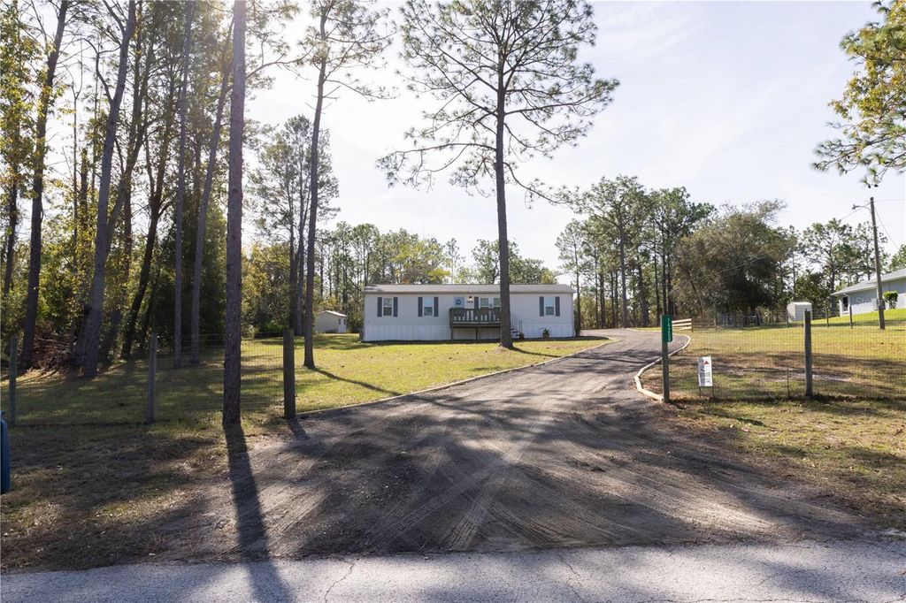 Photo of 14258 Highgrove Road, Spring Hill, FL 34609 (MLS # W7880409)