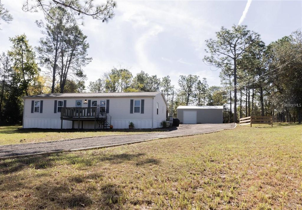 Photo of 14258 Highgrove Road, Spring Hill, FL 34609 (MLS # W7880409)