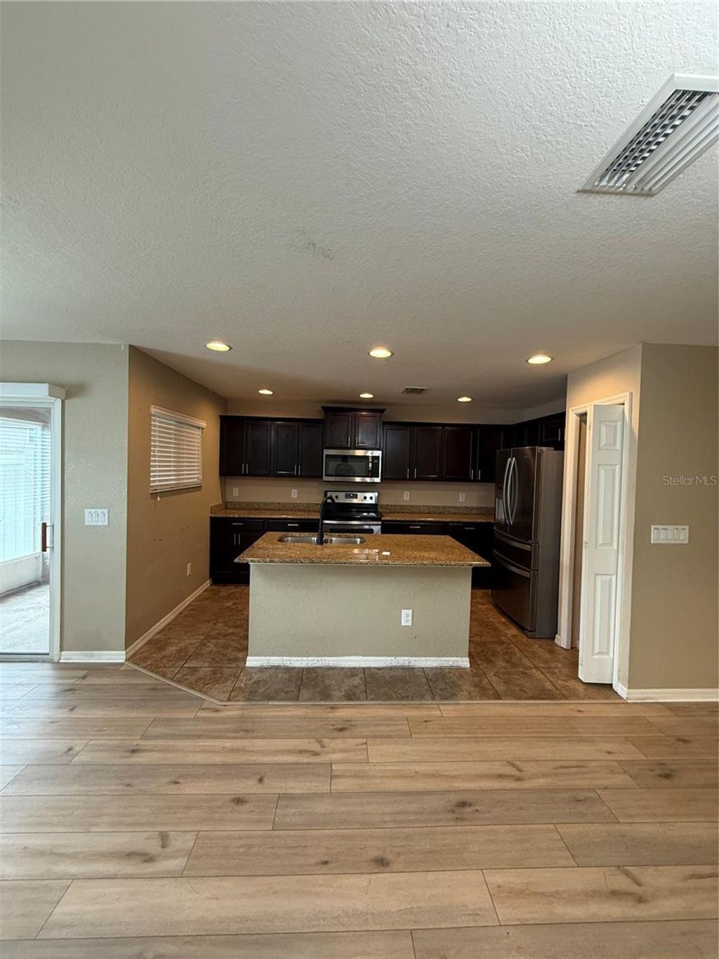Photo of 5043 Cactus Needle Lane, Wesley Chapel, FL 33544 (MLS # O6329075)