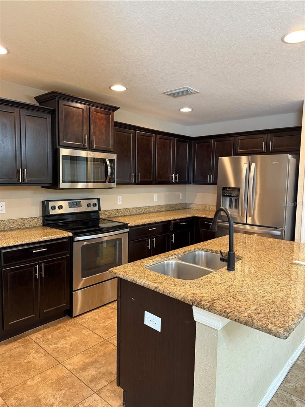 Photo of 5043 Cactus Needle Lane, Wesley Chapel, FL 33544 (MLS # O6329075)