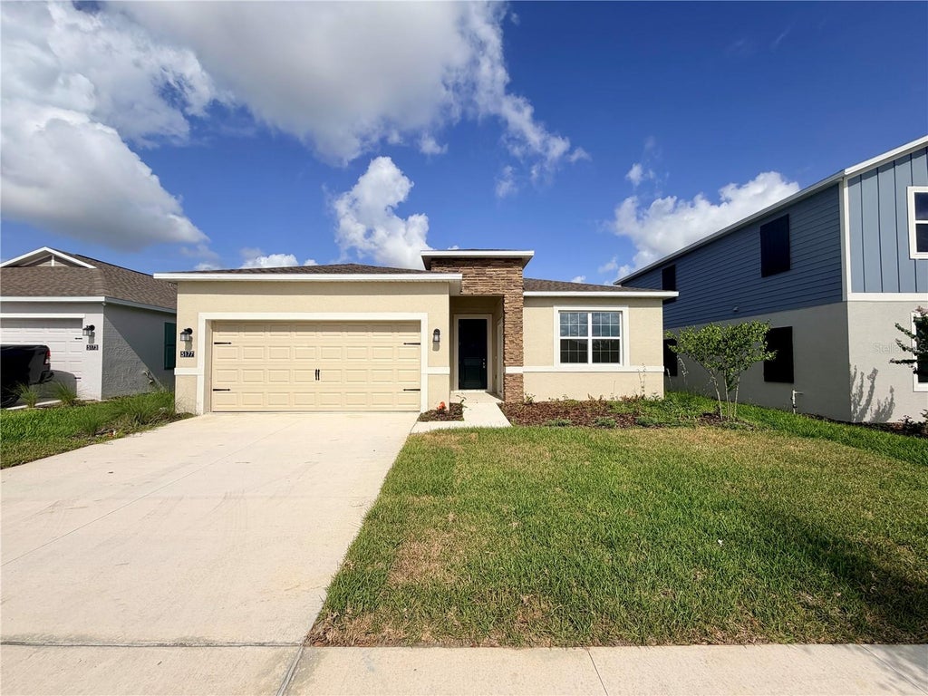 Photo of 5177 Green Belt Drive #UNIT A, Haines City, FL 33844 (MLS # O6419078)