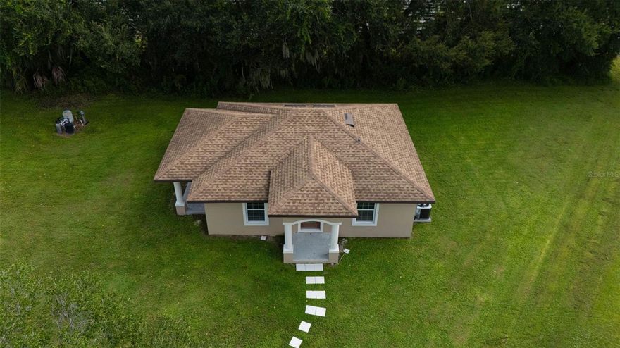 Be the very first to live in this stunning new 1 bedroom, 1 bath home offering approximately 900 square feet of thoughtfully designed living space. This private, fully detached cottage provides the comfort and feel of a single-family home with the convenience of low-maintenance living.

Step inside to find an open-concept layout featuring a spacious living room and a flexible nook—perfect for a home office or reading space. The gorgeous kitchen is a true highlight, complete with a large stone island with bar seating, new stainless steel appliances, ample cabinet space, and a pantry. A washer and dryer are included for your convenience.

The bathroom boasts a beautiful walk-in shower and generous storage space. French doors lead to a covered side patio overlooking a peaceful wooded area, creating the perfect spot to relax or entertain outdoors.

Nestled in a quiet cul-de-sac, this home combines comfort, style, and privacy—all within minutes of I-4, providing easy access to Tampa, Plant City, and Lakeland. Enjoy the serenity of country living with the convenience of nearby amenities.
Call, text, or email to schedule your showing!

$50 application fee per adult, $100 admin fee and $2000 deposit due upon approval. Lease signed within 72 hours of approval. Pet will be considered but fees are required $30 pet rent monthly and $300 non-refundable pet fee. At this time POBox is required until separate mailbox can be added.