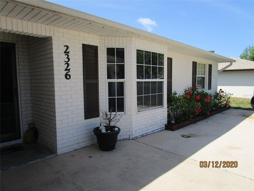 Open floor plan 3 bedroom 2 bath block pool home located in Florida Shores.  Entering the home you will feel the spaciousness of the great room, kitchen and dining.  The home has tile floors, wood cabinets, stainless appliances, granite counter tops, updated light fixtures and ceiling fans.  Kitchen offers large breakfast bar/island and breakfast nook area for small table.  The dining area has ample room for large table or could be used as a family room that leads out onto the screened porch.  Step outside and enjoy your own private pool with concrete pool deck and waterfall.  Backyard is privacy fenced and also has small shed that is great for extra storage space.  This block home with a double car garage and large driveway make for a great family home.  Only minutes to New Smyrna Beach, river, beach, shopping and schools. ;Water: City