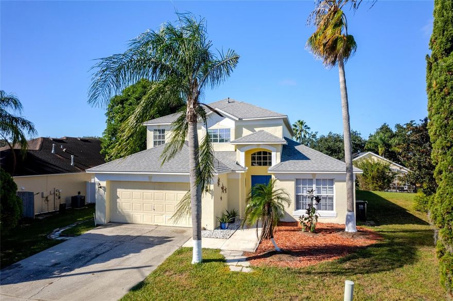 Welcome to 113 Santana Place and the charming community of the Manors at Westridge.  This highly sought after community stands out from the rest in the area because of all the extras!  A community pool, sand volleyball court, pickleball, tennis court, playground, and basketball court are within footsteps of your front door!  This home is the biggest floor plan in the community and includes 5 bedrooms and 3 baths at 2200 square feet.  This home has all the upgrades done and is move-in ready including a BRAND NEW ROOF!  From the minute you step inside you are captivated by the tall vaulted ceilings, fresh paint, upgraded flooring and the abundance of natural light.  The lot is also rare because you have extra space, great for a fire pit or outdoor kitchen and entertaining area.  A well-manicured lawn creates great curb appeal and makes this home STAND OUT.   Please note that there are TWO bedrooms on the first floor, which is also super rare!  This makes it easy for those who don’t like stairs!  The open floor plan is exactly what you are looking for and especially when you have a view and easy access to the backyard pool and patio.  You actually have PATIO space.  Leave the door open and enjoy the sounds of the pool because the entire pool area is screened in.  Great to sit out, cook out and eat outside.  A separate dining room is available for great family dinners and gatherings.  Pay close attention to the pictures that were just taken.  Especially the floors. It is also important to mention that the two-car garage has been painted and refreshed.  The community is close to dining, shopping, grocery and medical.  It is also close to all the theme parks and beaches that Central Florida is famous for.  This home CAN BE full-time, part- time or a Vacation Home for Rental.   Welcome home!
