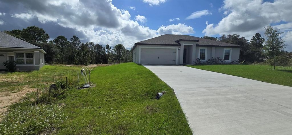 Photo of 310 Amberjack Lane, Kissimmee, FL 34759 (MLS # O6355904)